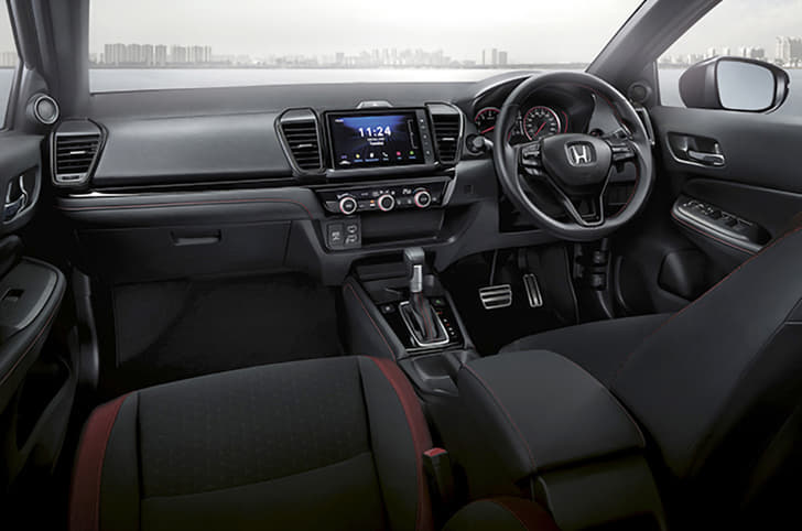 Dashboard too borrowed straight from the City sedan. Red-highlights unique to the RS model.