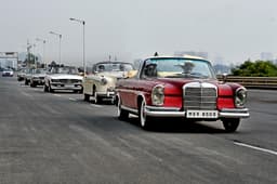 Viveck and Zita Goenka lead a convoy in their 220 SE.
