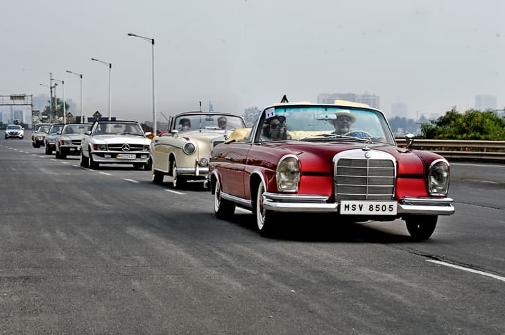 Viveck and Zita Goenka lead a convoy in their 220 SE.