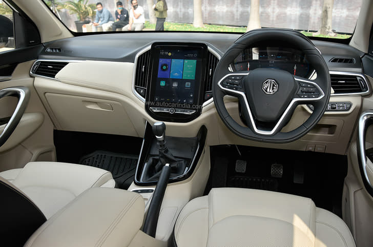 The dashboard layout remains unchanged, with the 10.4-inch portrait-oriented touchscreen taking centre stage.
