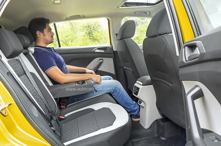 Rear seat well contoured but best for two. Middle passenger gets three-point seatbelt as well.