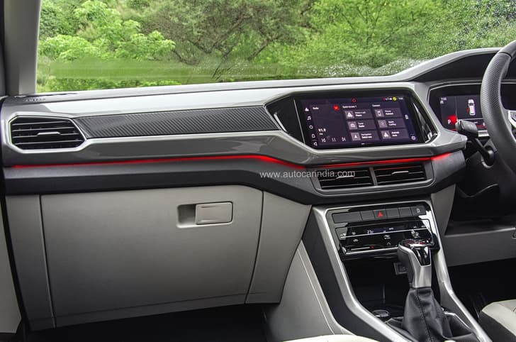 Ambient lighting neatly executed in the dashboard.