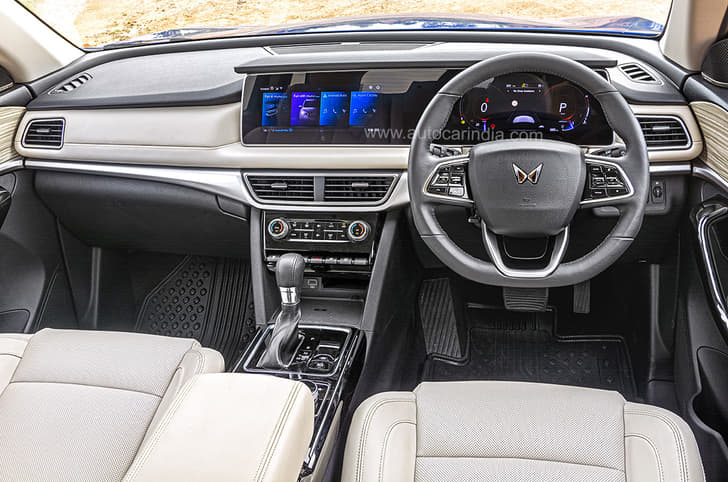 XUV700's dashboard is dominated by two 10.25-inch screens. 