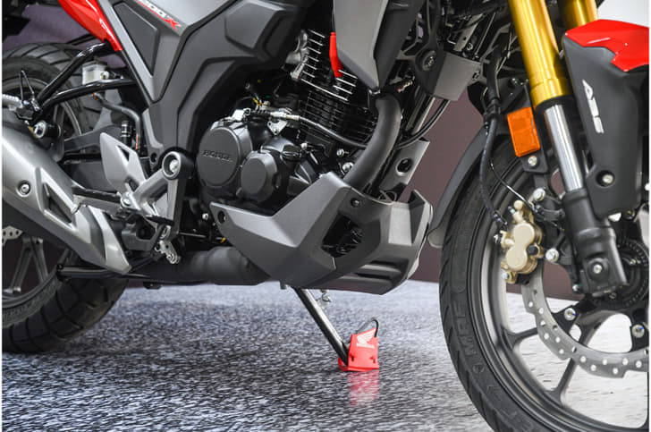 The new belly pan is made from plastic and unlikely to provide much protection against impact. Ground clearance remains the same 167mm as the Hornet.