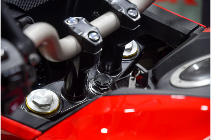 A pair of large risers have been used to bring the handlebar closer to the rider.