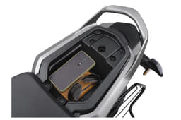 It has storage space located under the pillion seat.