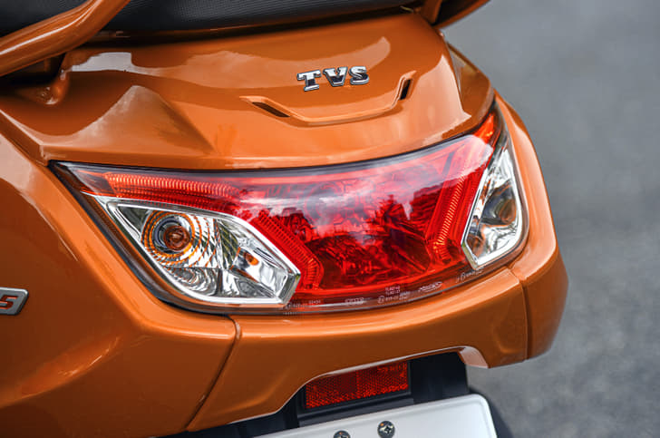 The rear section is occupied by a large tail light assembly.