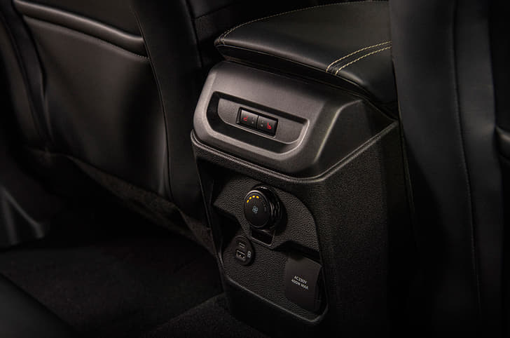 2022 Ford Everest rear USB ports and climate control buttons.