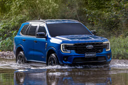 2022 Ford Everest wading through water right side view.