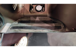 The floorboard also features a rather unusual wooden finish.