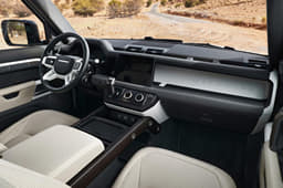 Dashboard design and infotainment system almost identical to other Defender models in the range. 