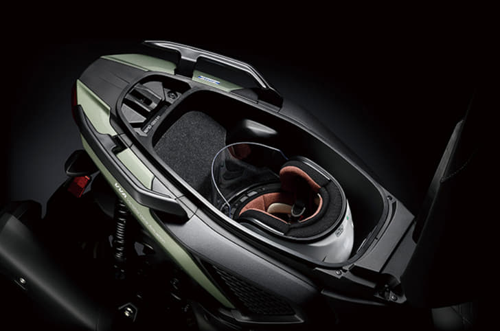 X Force's underseat storage can easily fit a half-face helmet.