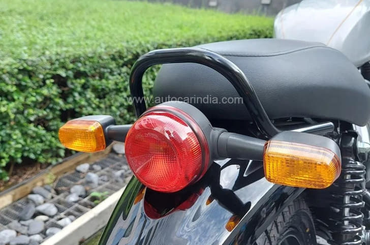 Retro gets halogen taillamp, rectangular indicators and tubular grab rail. 