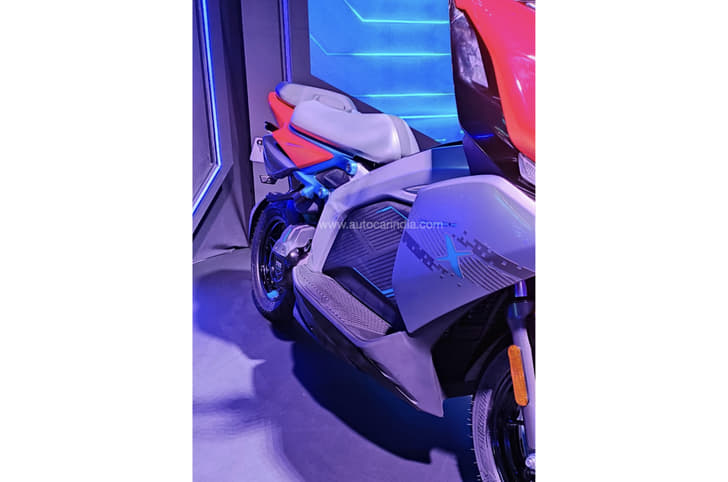 The spine of the frame takes up the area of the floorboard and the X's PMSM motor is RAM air-cooled.