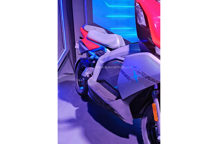 The spine of the frame takes up the area of the floorboard and the X's PMSM motor is RAM air-cooled.