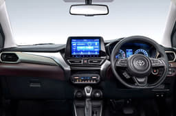 Gets a similar dual-tone theme inside the cabin with the same features as Fronx.