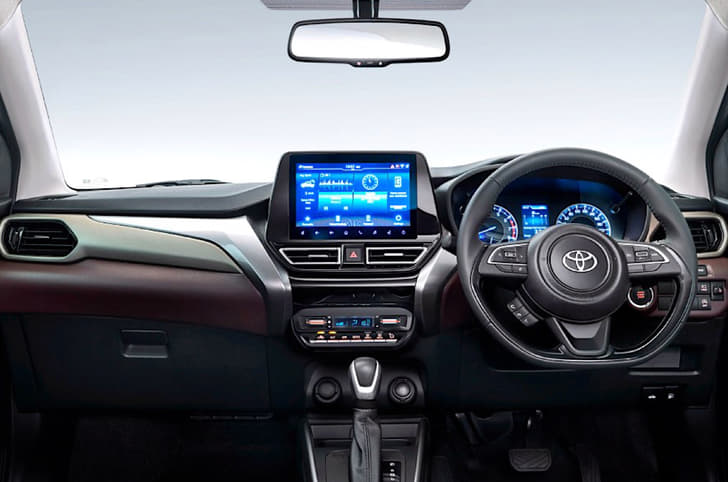 Gets a similar dual-tone theme inside the cabin with the same features as Fronx.