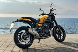 A smaller 11 litre fuel tank, different subframe, telescopic fork and 17-inch alloy wheels are the key differences between the Guerrilla & the Himalayan.