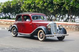A rare 170V Cabrio-Limousine cruising down the sea side.