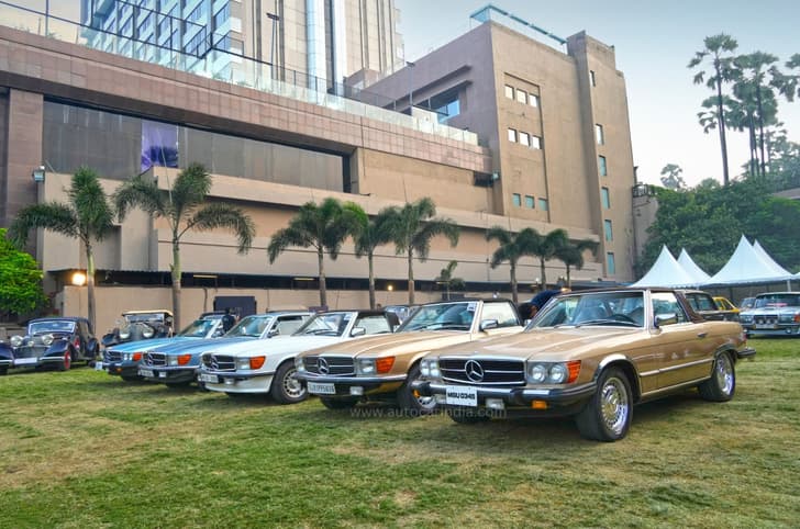 Multiple R107 SLs standing alongside an SLC coupe.