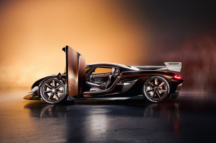 Koenigsegg Jesko Sadirs spear side image with doors open in studio