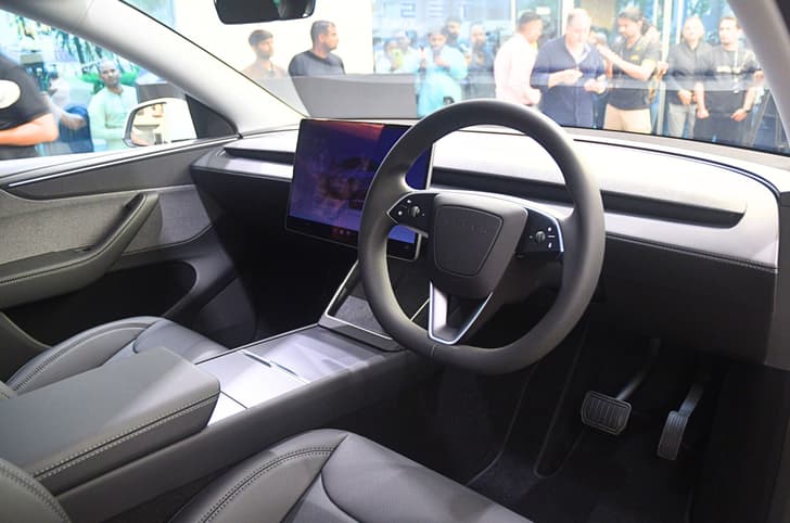 Tesla Model Y Only physical controls are found on the steering wheel; no instrument cluster. Tesla Model Y Only physical controls are found on the steering wheel; no instrument cluster.