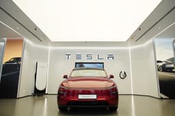 Tesla showroom India with Model Y and Supercharger 