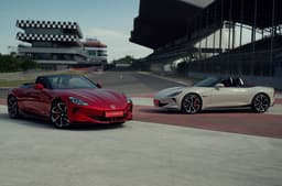 MG Cyberster exterior front and side, rear and white