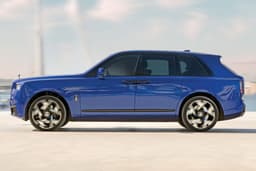 rolls royce cullinan black badge on road