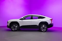 Mahindra XEV 9e Pack Two exterior white side in studio