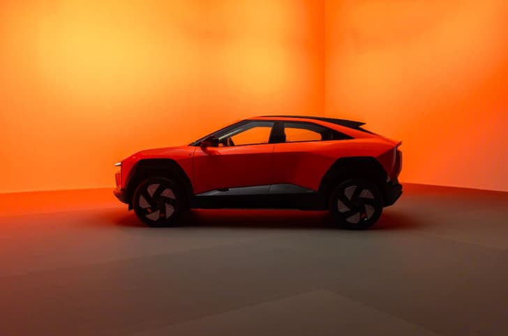 Mahindra BE 6 orange exterior in studio side 