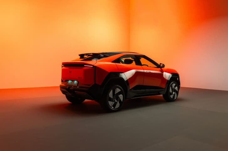 Mahindra BE 6 orange exterior in studio rear 