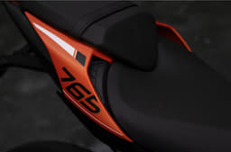 Triumph Street Triple R in orange rear seat shot