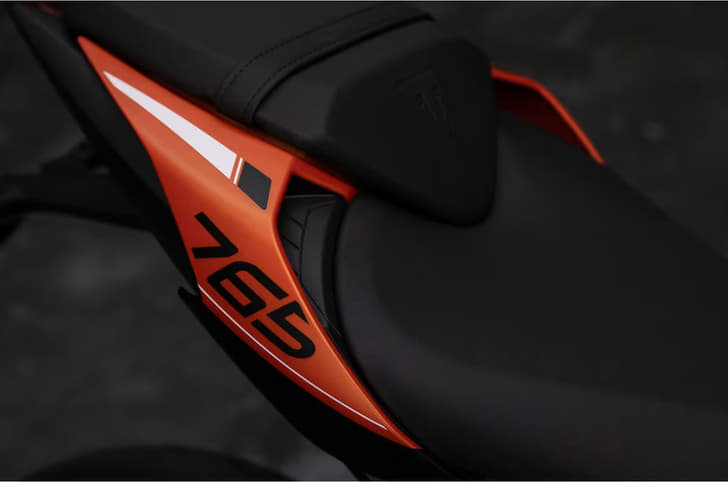 Triumph Street Triple R in orange rear seat shot