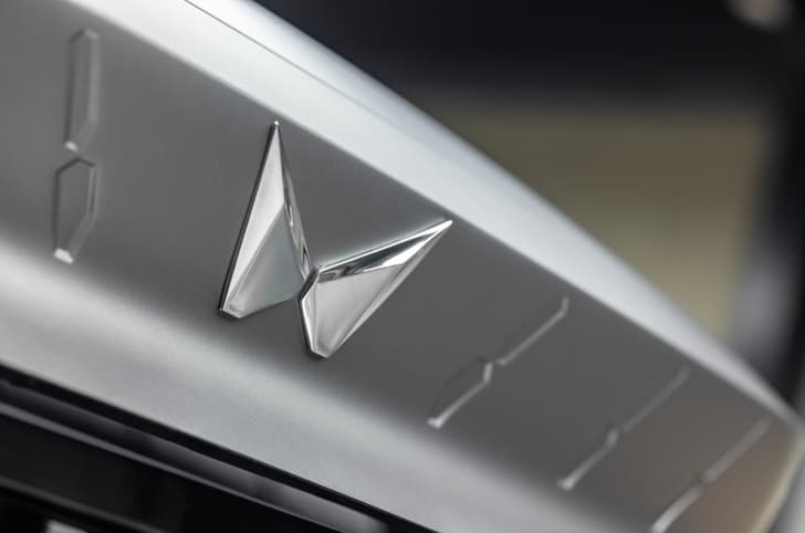 Mahindra Vision X twin Peaks logo