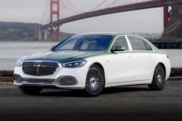 Mercedes-Maybach S 680 Edition Emerald Isle front three-quarter view in green and white with 21-inch forged wheels.