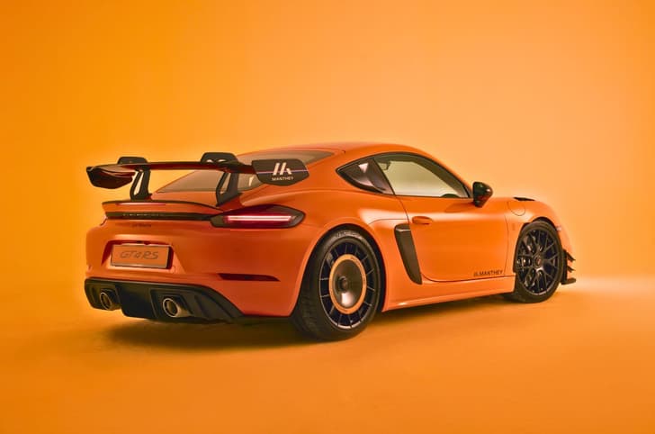 Porsche 718 Cayman GT4 RS with Manthey kit in orange read right angle