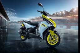 TVS Ntorq 150 yellow front right static on track