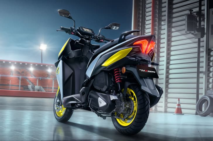 TVS Ntorq 150 yellow rear left static on track