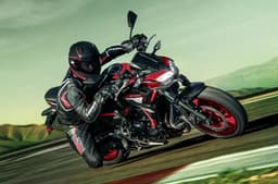 Kawasaki Z650 front right cornering shot on track