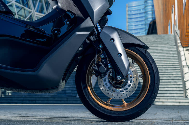 The scooters gets 13-inch wheels with 230mm disc brakes at both ends. 