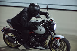 Triumph Trident 800 riding shot from side profile.