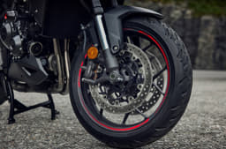 The front gets dual 310mm front discs with Nissin four-piston radial calipers.