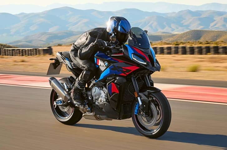 BMW M 1000 XR riding shot front three quarter