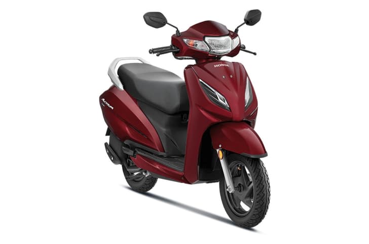 Honda Activa red colour front right side static in studio