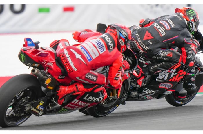 Marc Marquez chasing Marco Bezzecchi in 2025 Austrian MotoGP race