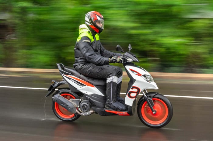 Aprilia SR 175 right side profile riding shot