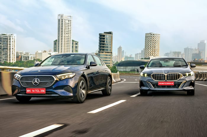 Mercedes E-Class vs BMW 5 Series front action