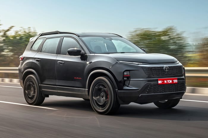 Tata Safari petrol front right side driving on road