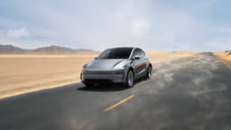Tesla Model Y Front Right Three Quarter Tesla Model Y Front Right Three Quarter